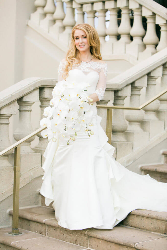 Bride walking down the steps of the Ritz Carlton Marina del Rey 