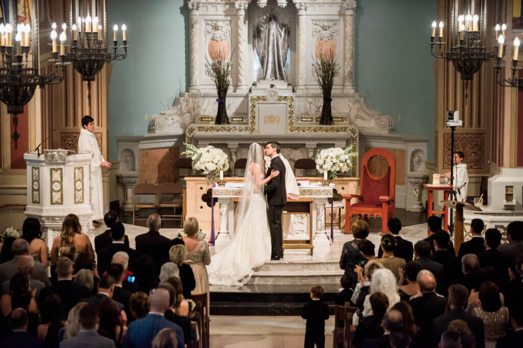 Bride and groom kissing 