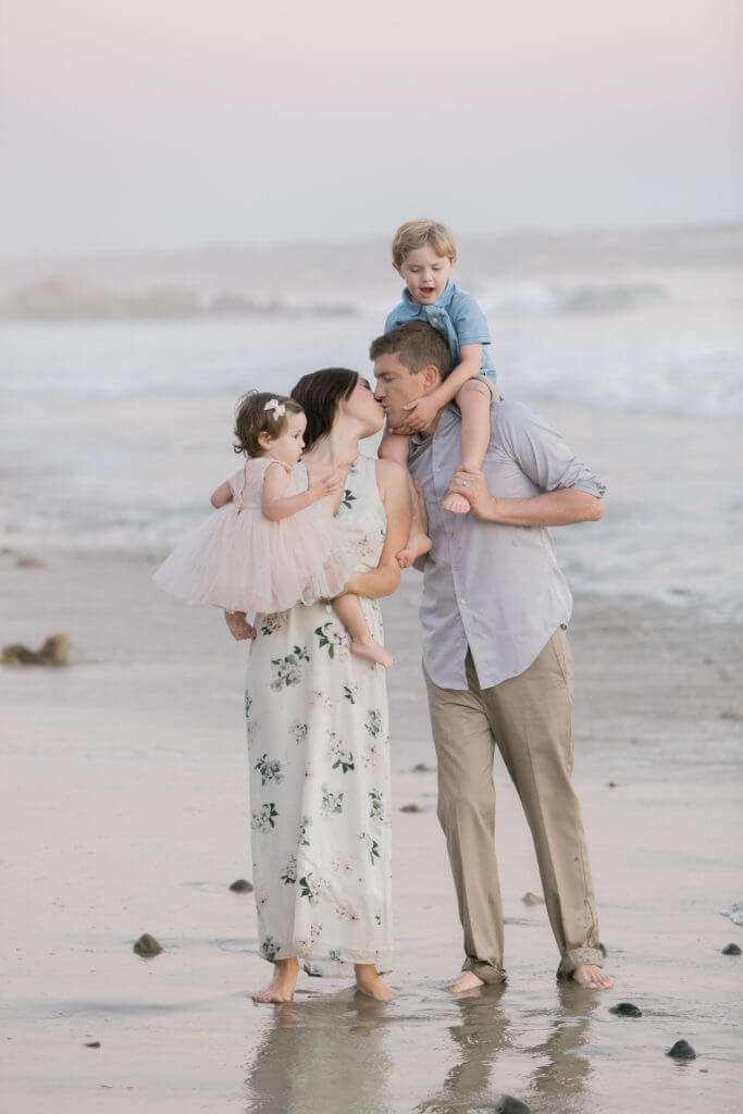 family of four wearing pastel tones family session 