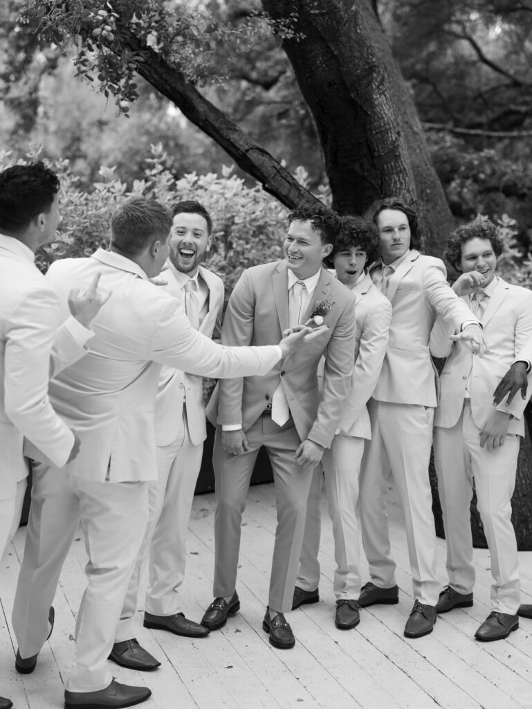 Groomsman smilling together