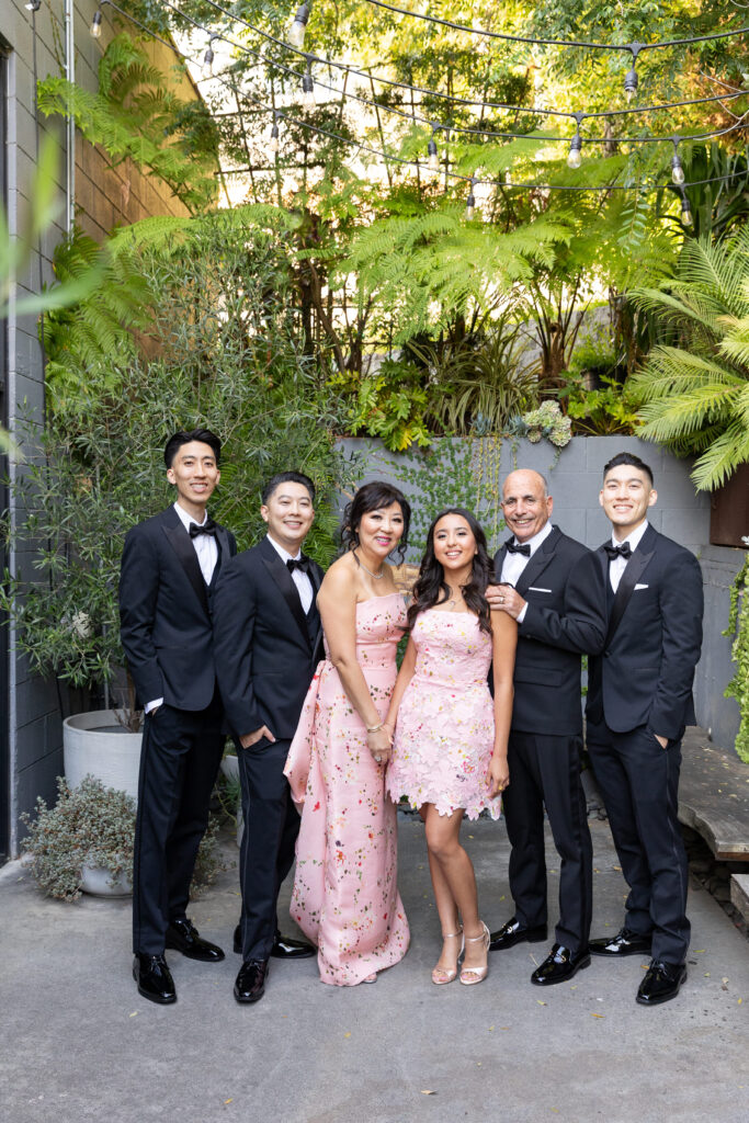 A family posing at Playa Studios during a Bat Mitzvah